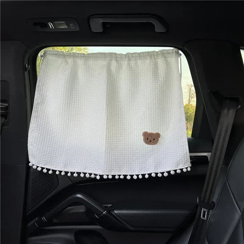 Auto-Sonnenschutz mit Saugnapf und Cartoon-Design – SwissGlanzGarage Autopflege Schweiz
